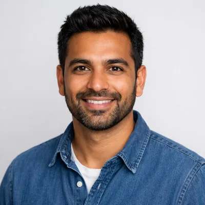 Photorealistic avatar of a professional adult with mixed ethnicity, wearing casual attire on light background.